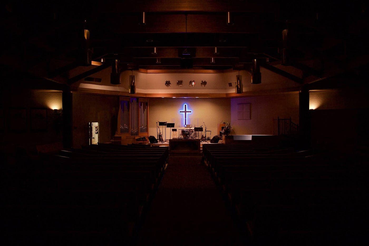 blue cross in an empty sanctuary